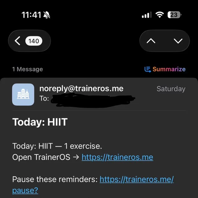TrainerOS reminder email on a phone, with a one-tap pause link